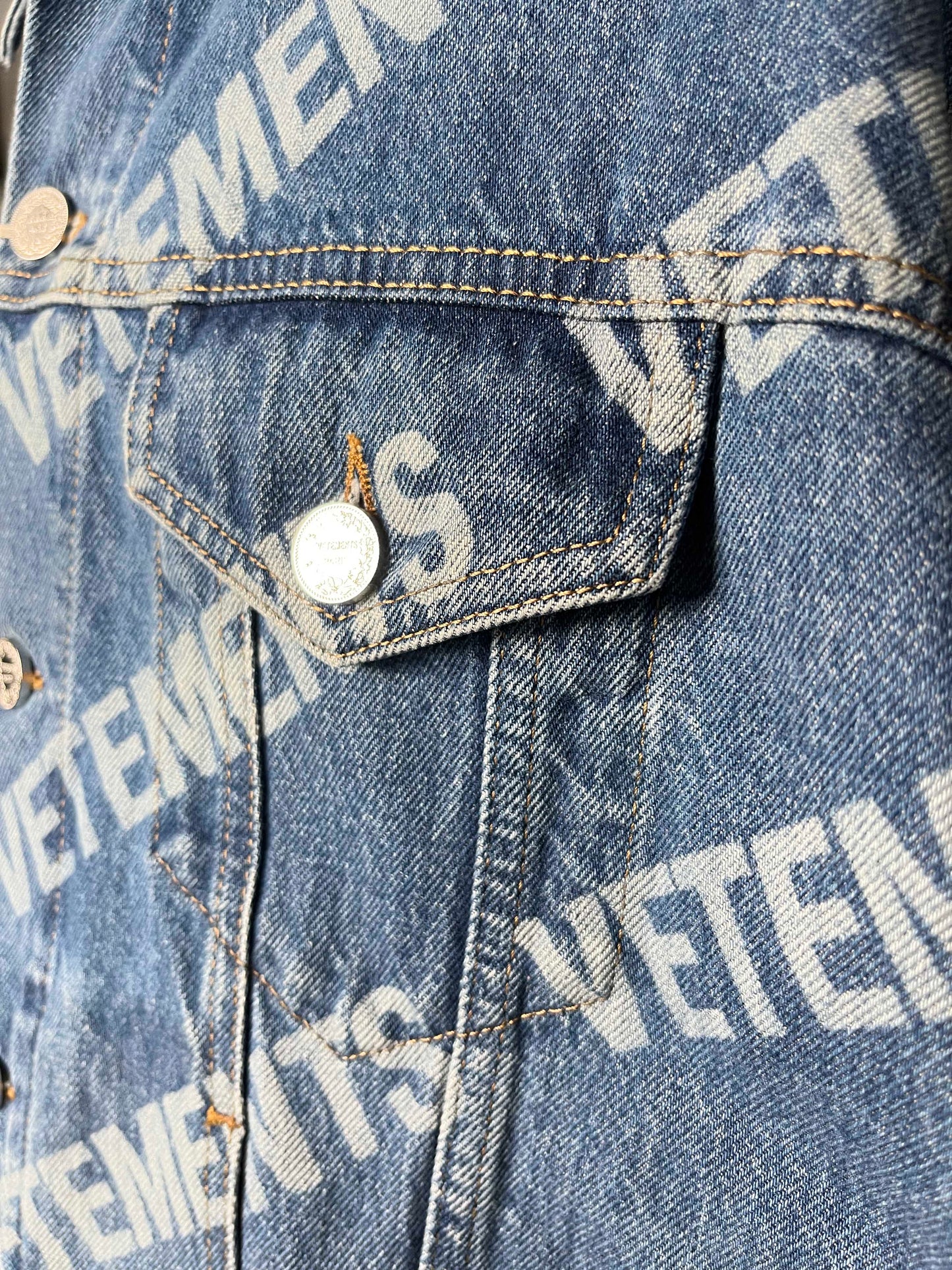 Vetements All-Over Logo Printed Denim Jacket